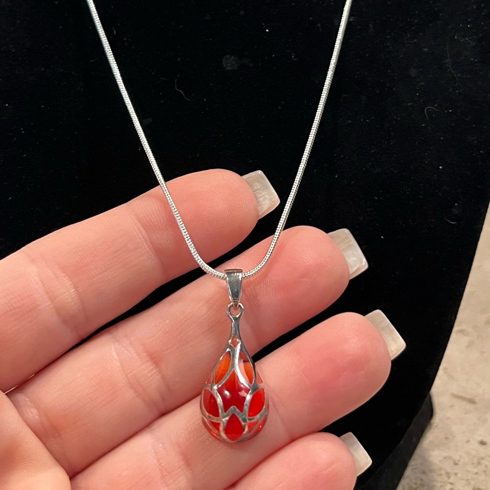 18” sterling silver with amber colored silver glass pendant